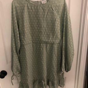 Sage green dress with circle details